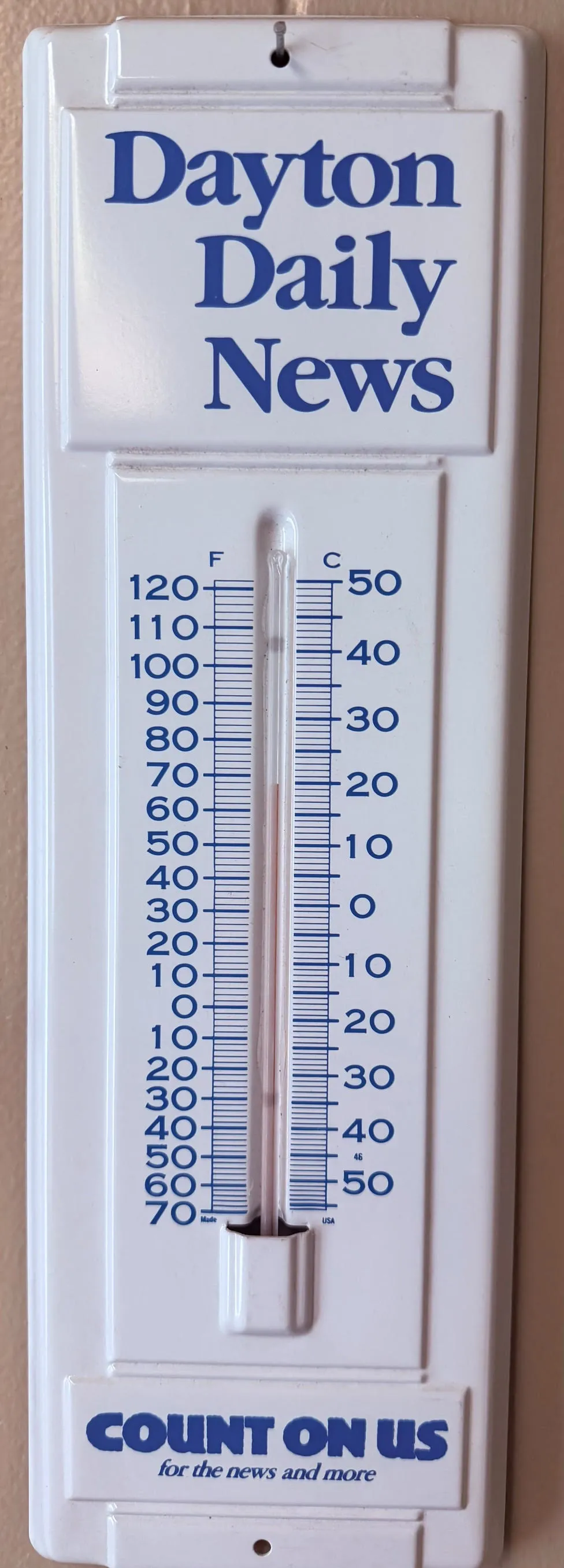Vintage Dayton Daily News advertising thermometer, white and blue branded promotional thermometer